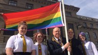 Pupils help unfurl rainbow flag in Dundee